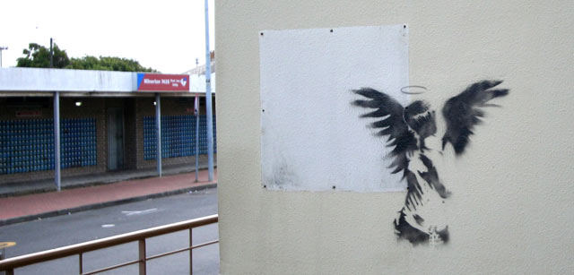 emo angel street art on wall